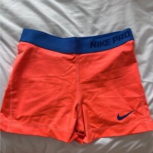 Nike Pro Bright Orange Shorts with Blue Waistband